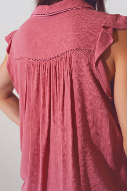 Blusa con volantes en la manga corta en rosa