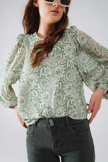 Blusa de gasa verde con estampado floral y mangas globo largas