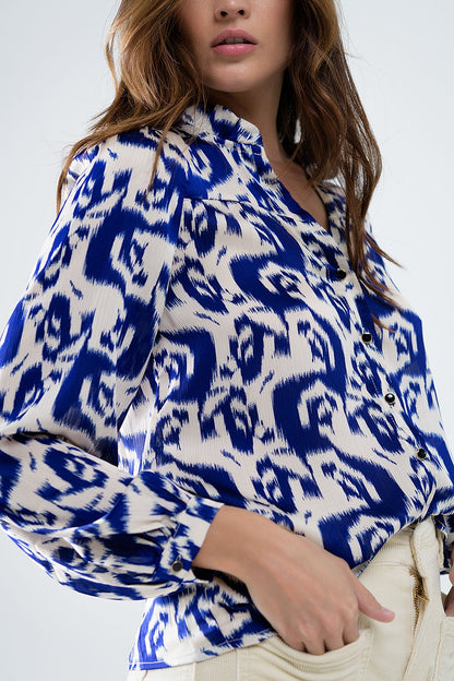 Blusa de manga globo con estampado abstracto en azul marino y blanco