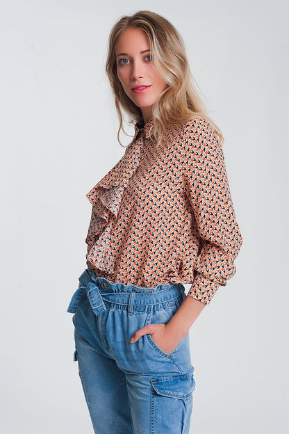 Blusa de manga larga con beige y detalle de volantes