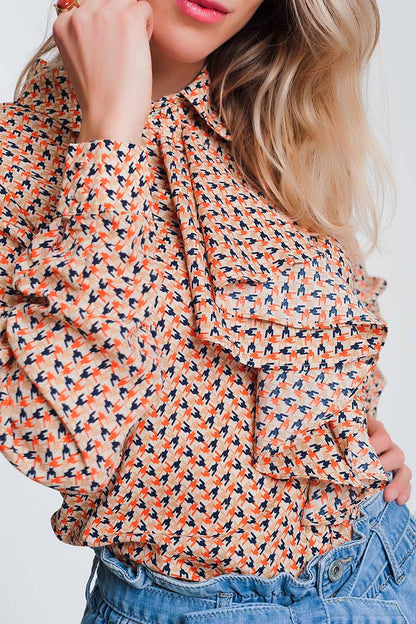 Blusa de manga larga con beige y detalle de volantes