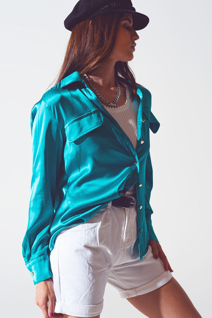 Blusa de saten en turquesa