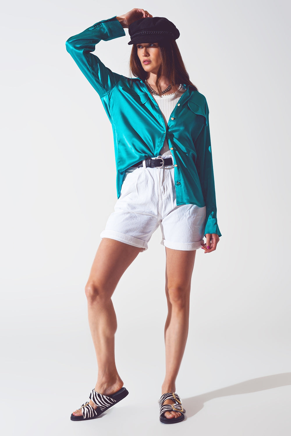 Blusa de saten en turquesa
