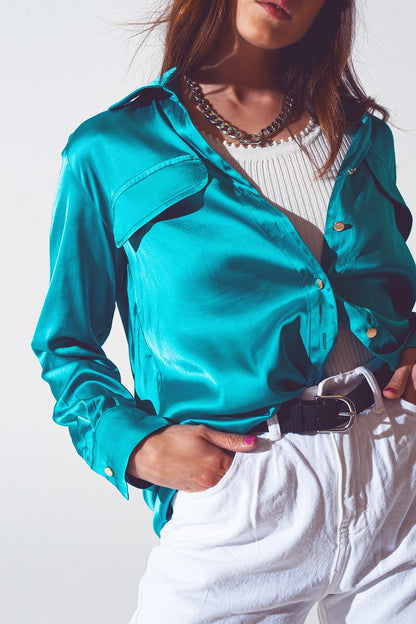 Blusa de saten en turquesa