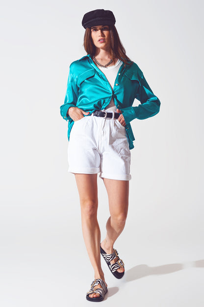 Blusa de saten en turquesa