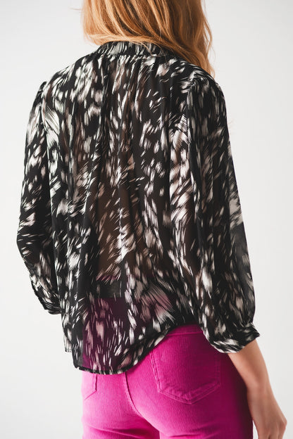 Blusa monocromática con estampado de gasa transparente