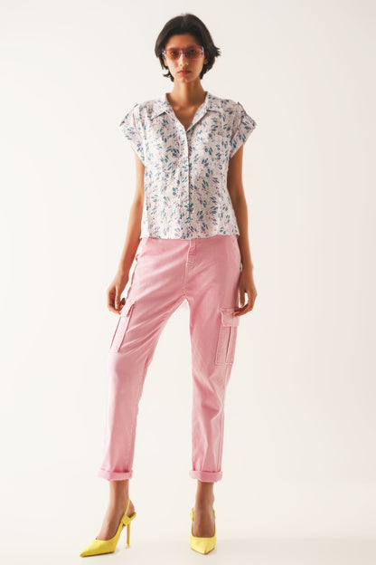 Blusa morada con bolsillos y estampado de florecitas