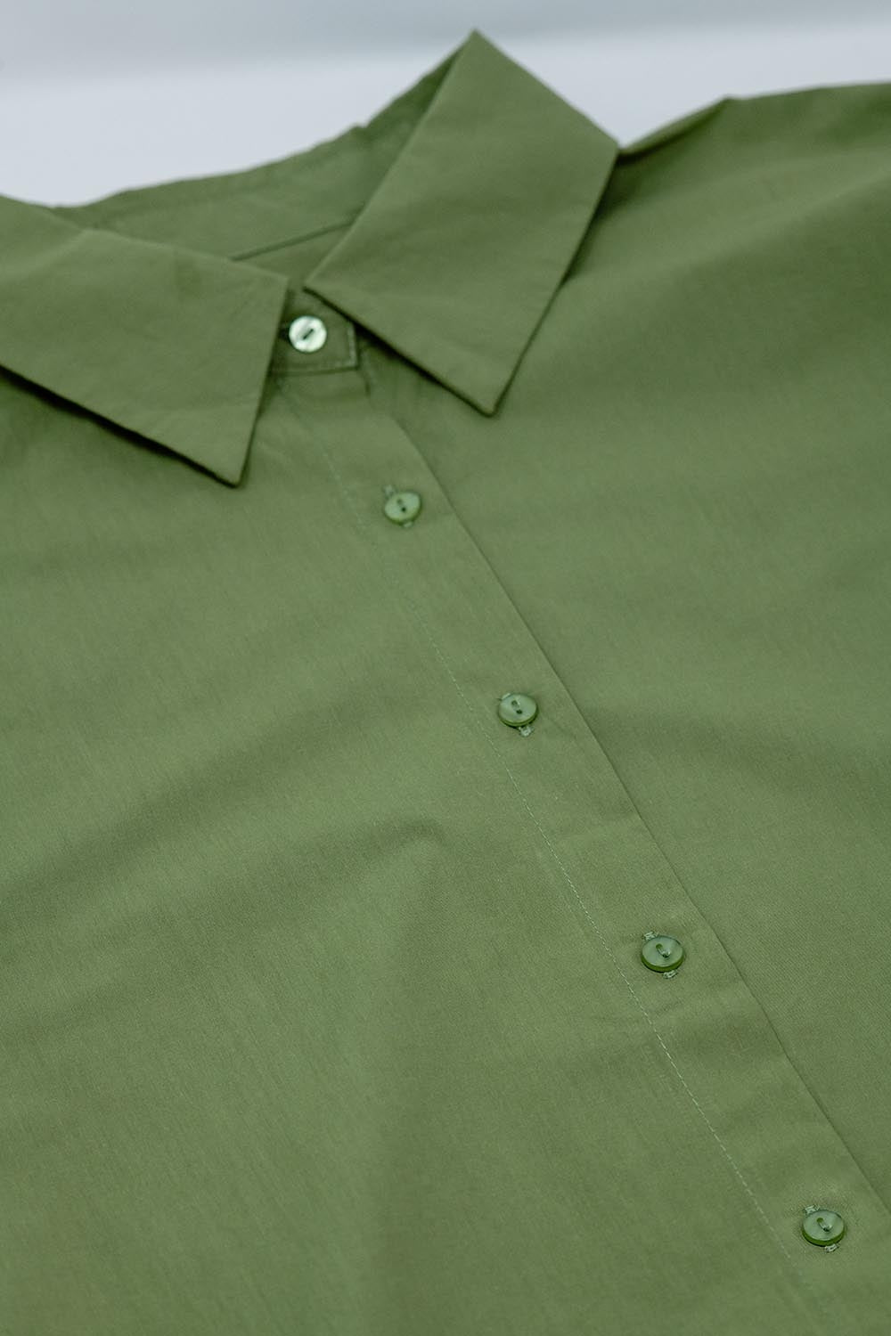 Blusa oversize verde de manga corta