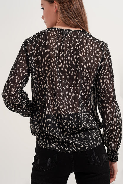 Blusa transparente de manga larga con estampado