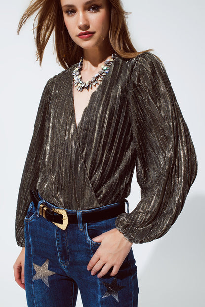 Body con brillo con escote en V profundo en color dorado