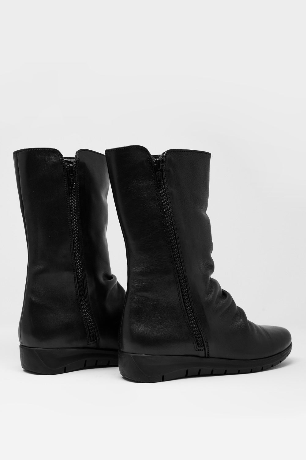 Botas holgadas de media caña