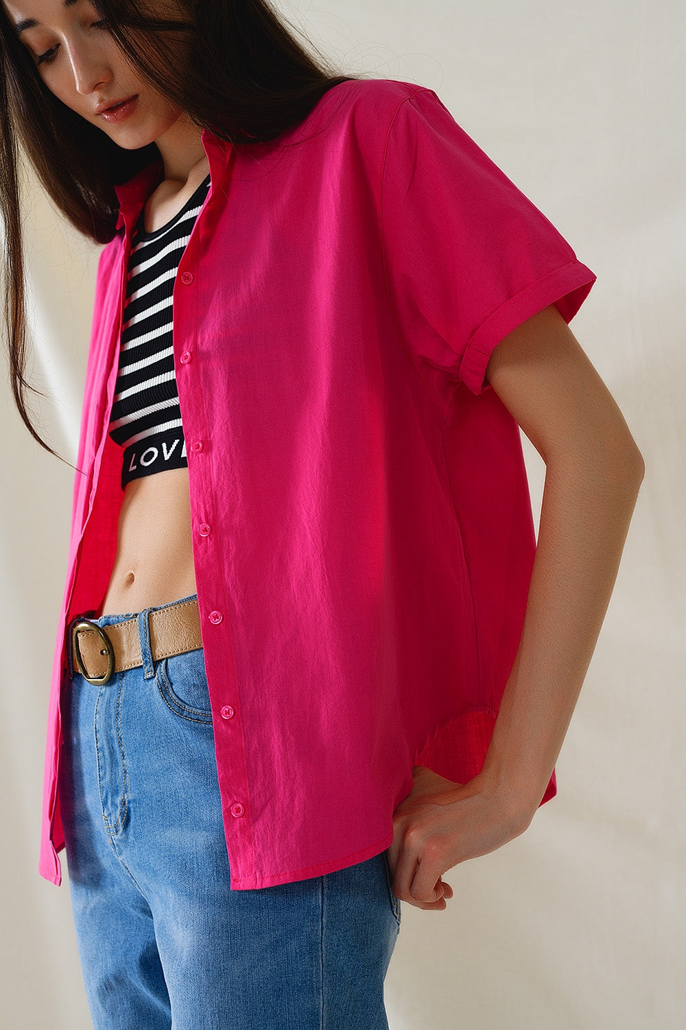 Camisa abotonada de manga corta en fucsia