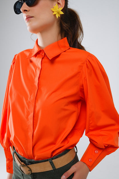 Camisa básica de popelín naranja con mangas largas globo