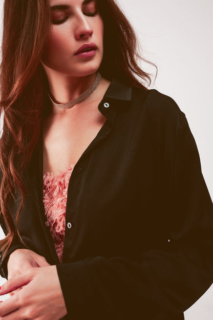 Camisa color negro holgada de manga larga de satén