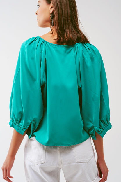 Camisa corta con botones en verde