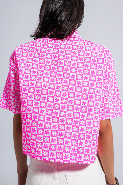 Camisa corta rosa con botones estilo años 90
