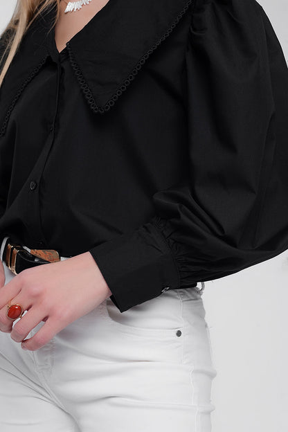 Camisa en negro con cuello extragrande