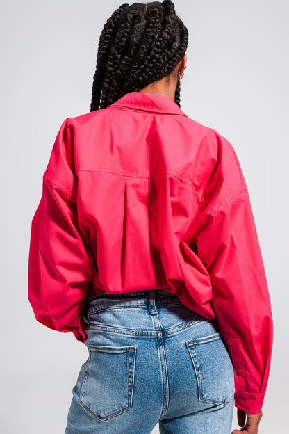 Camisa fuchsia con botones delanteros