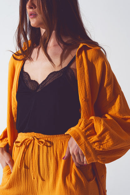Camisa holgada con textura en naranja