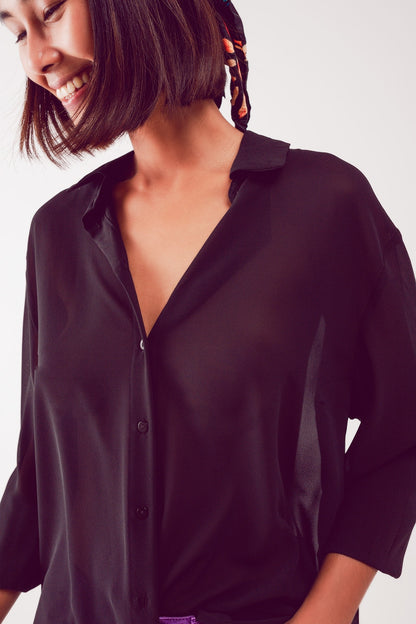 Camisa negra de chifón transparente