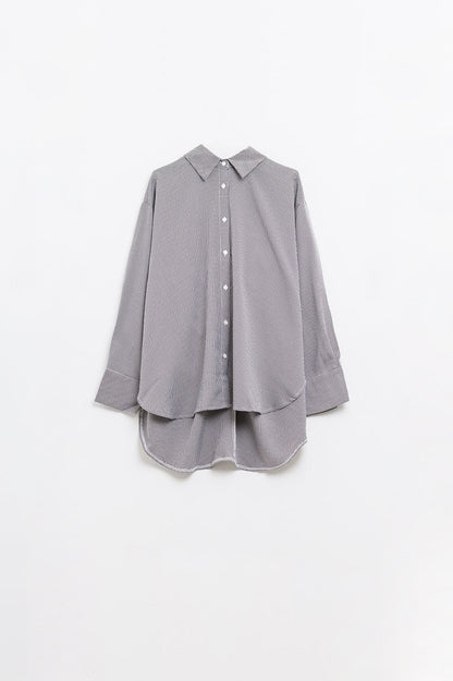 Camisa oversize de cuadros con detalle de lazo en blanco y negro