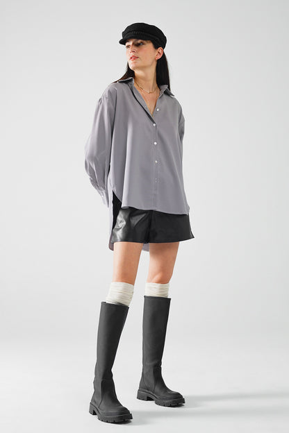 Camisa oversize de cuadros con detalle de lazo en blanco y negro
