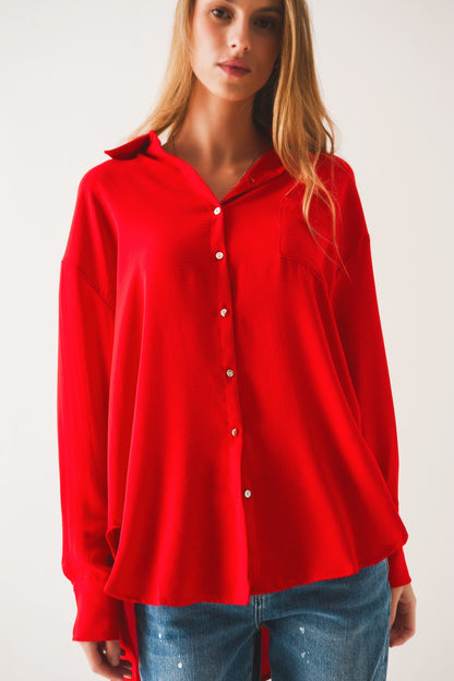 Camisa roja extragrande con detalle de bolsillo