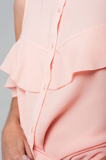 Camisa rosa con detalle de volante