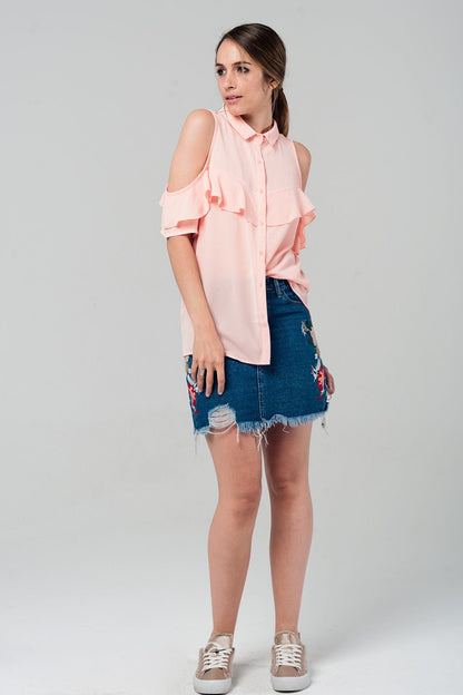 Camisa rosa con detalle de volante
