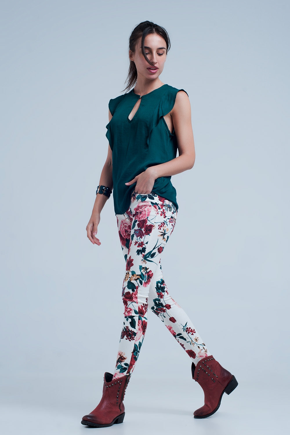 Camisa sin mangas con volantes en verde oscuro