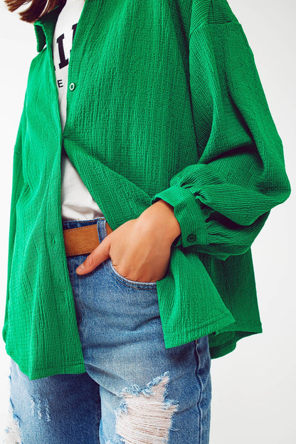 Camisa texturizada con mangas abullonadas en verde