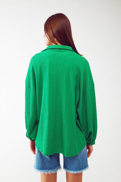 Camisa texturizada con mangas abullonadas en verde