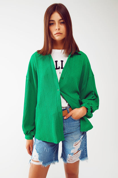 Camisa texturizada con mangas abullonadas en verde