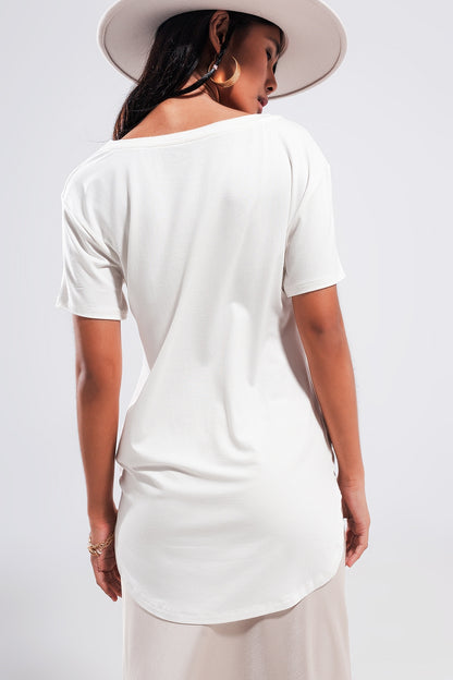 Camiseta blanca con texto New York City