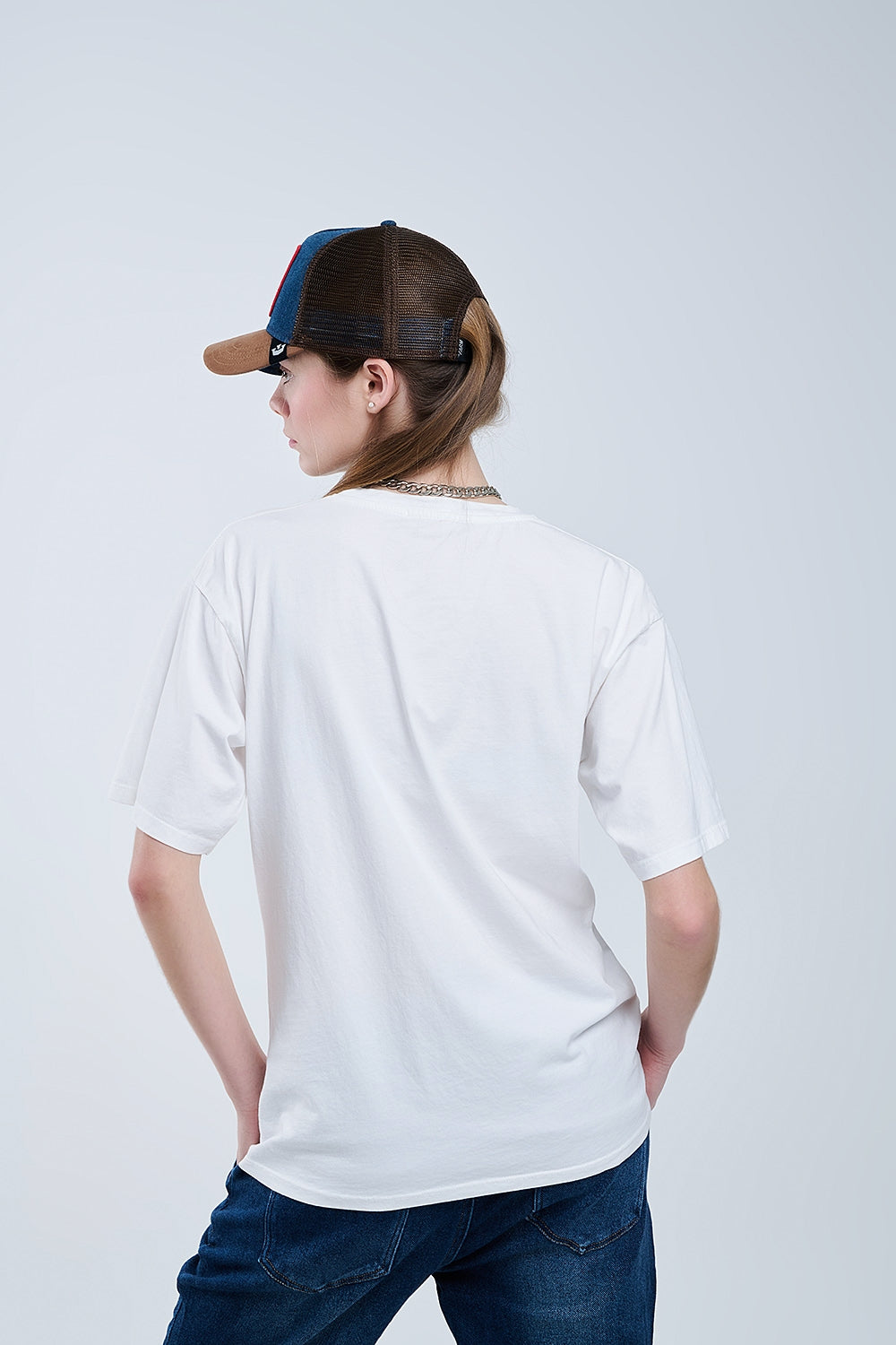 Camiseta blanca oversize con Soho New York en la parte delantera