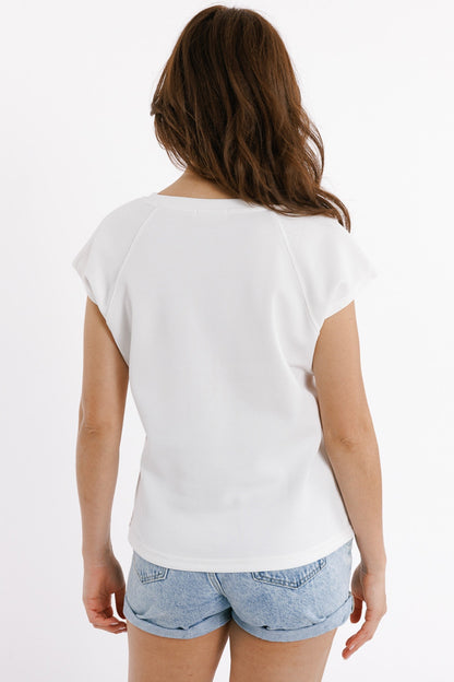 Camiseta con cuello redondo y logotipo Love en el pecho en blanco en punto de pique