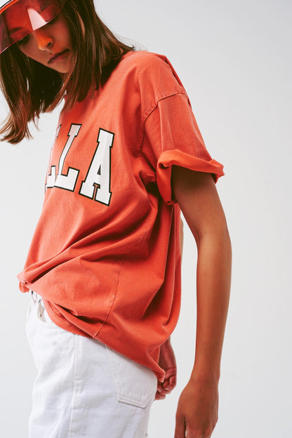 Camiseta con texto Bella en naranja