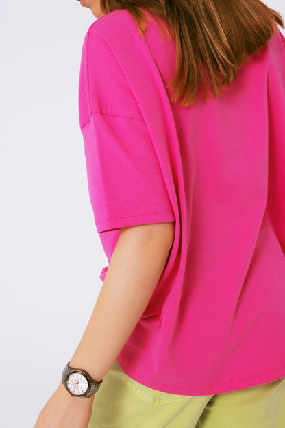 camiseta fuxia holgada con osito coloreado