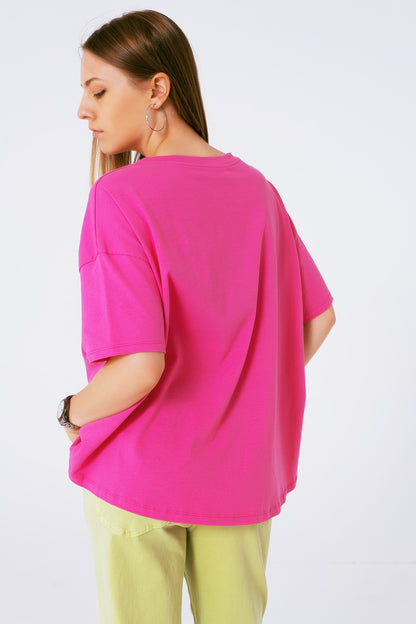 camiseta fuxia holgada con osito coloreado