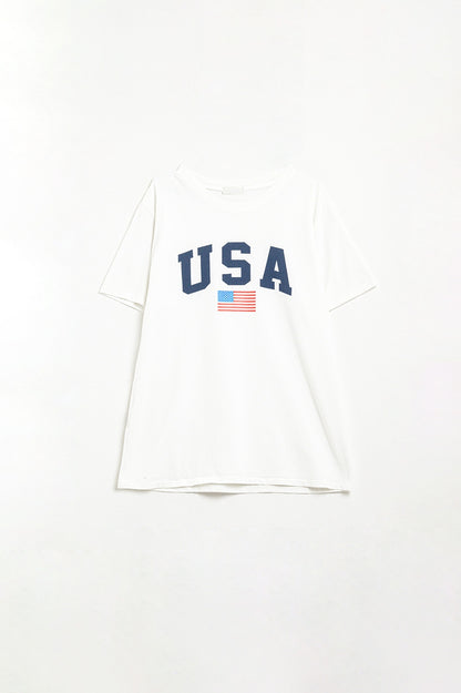 Camiseta larga holgada blanca con logotipo de USA