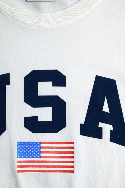 Camiseta larga holgada blanca con logotipo de USA