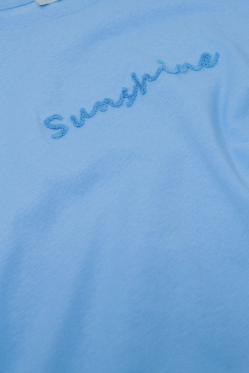 Camiseta Sunshine de gran tamaño con texto texturizado en la parte delantera en azul