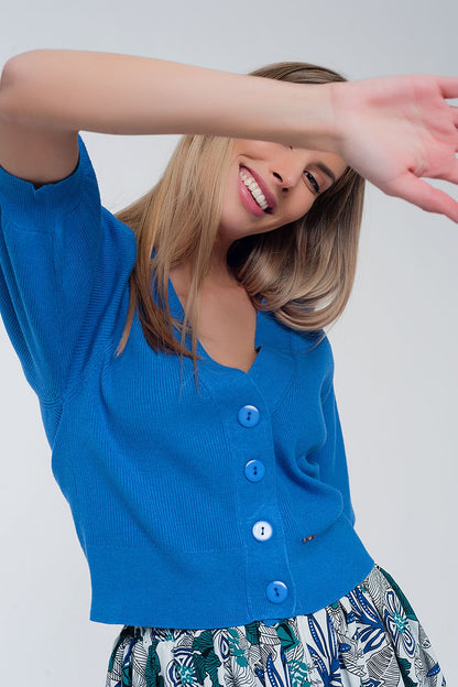 Cárdigan azul con mangas voluminosas
