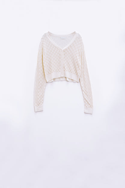 Cárdigan corto beige con estampado de rombos