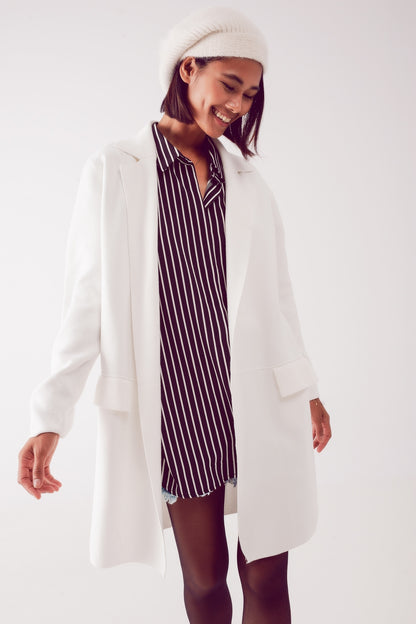 Cardigan extra grande en crudo con solapas
