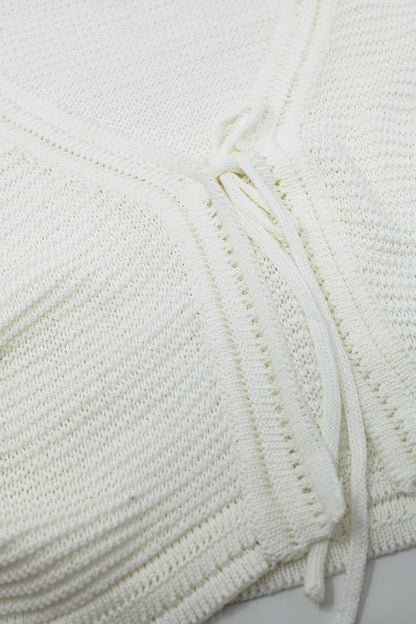 Chaqueta de punto de manga larga en blanco con detalle de nudo
