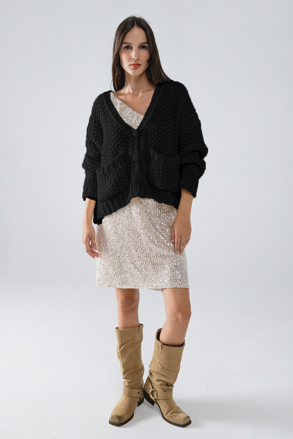 Chaqueta negra oversize de punto grueso con bolsillos
