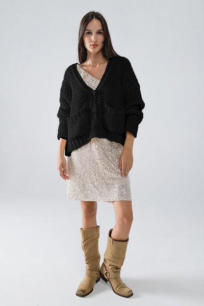 Chaqueta negra oversize de punto grueso con bolsillos
