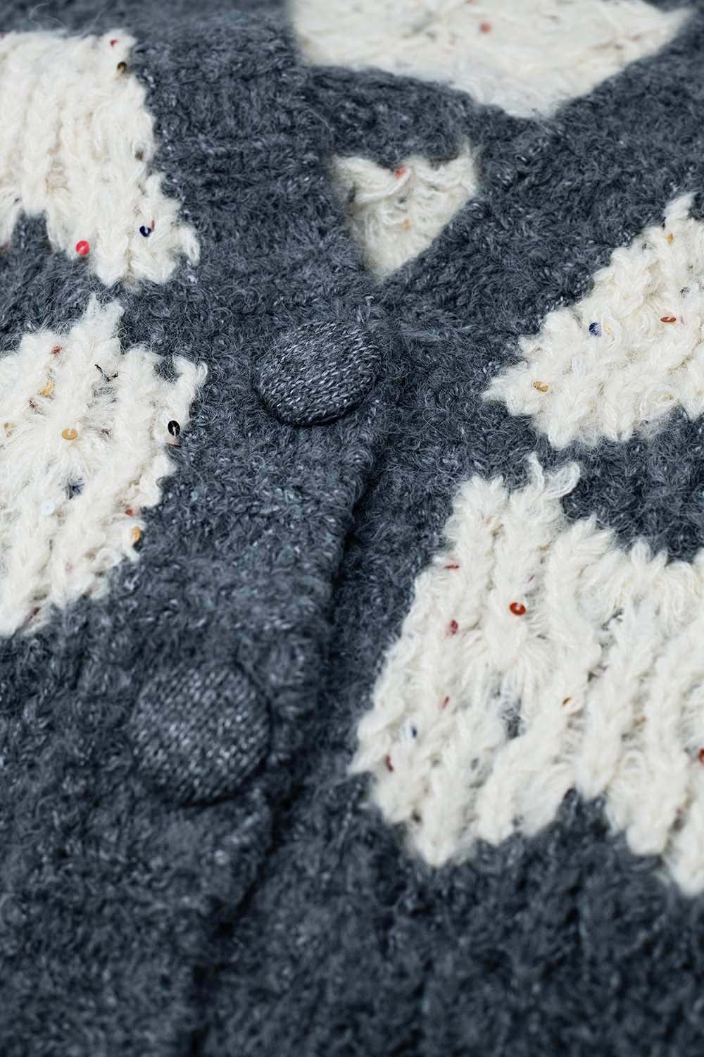Chaqueta oversize de punto grueso con detalles de lentejuelas en gris