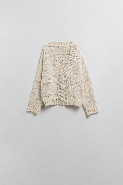 Chaqueta oversize de punto grueso en color crema con detalle de lentejuelas